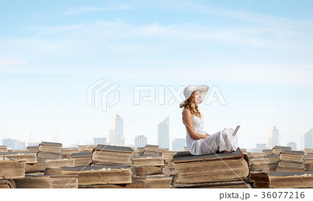 Lady using laptop 36077216