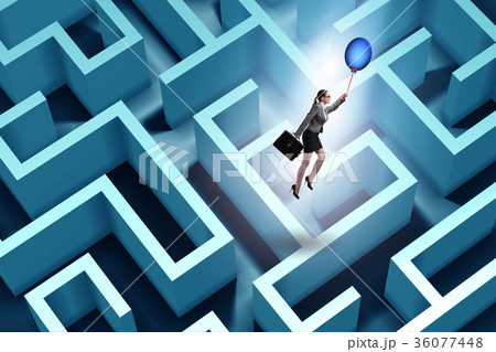 Businesswoman escaping from maze on balloon Businesswoman escaping from maze on balloon 36077448