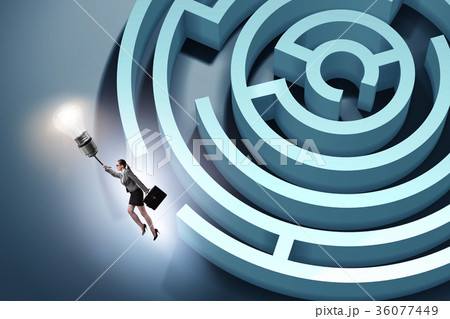Businesswoman escaping from maze on balloon Businesswoman escaping from maze on balloon 36077449