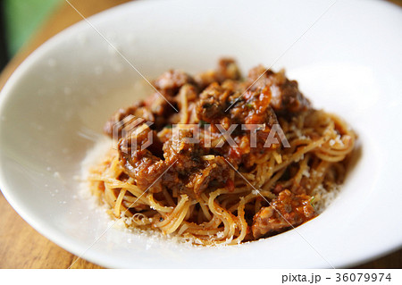 Beef stew spaghetti on wood background 36079974
