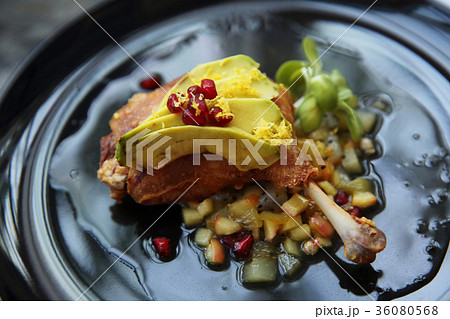 duck confit in black tone food 36080568