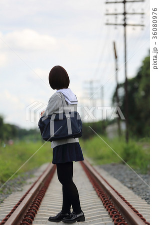 Portrait of Japanese school girl with countryside park Portrait of Japanese school girl with countryside park 36080976