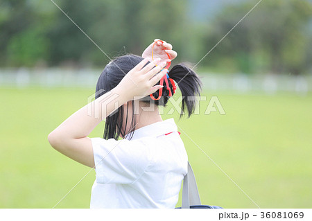 Japanese school in countryside with grass mountain and tree 36081069