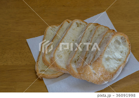 Fresh bread on wooden table Fresh bread on wooden table 36091998