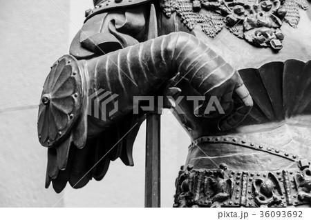 Hand in armour of the medieval knight statue 36093692