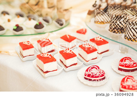 Different kinds of baked sweets on a buffet Different kinds of baked sweets on a buffet 36094928