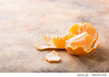 Fresh peeled mandarin tangerine Fresh peeled mandarin tangerine 36095244