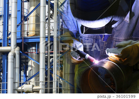 welding operator and industrial pipeline. 36101599