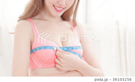 woman checking her breast 36103256