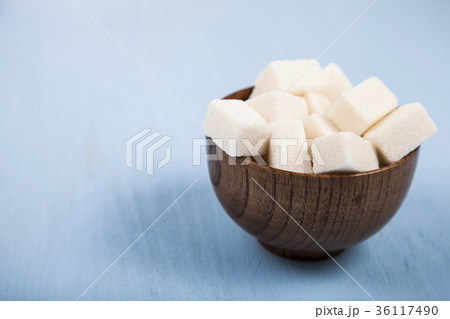 Sugar in a wooden bowl Sugar in a wooden bowl 36117490