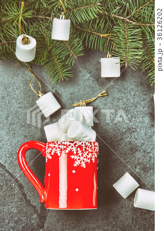 Holiday Christmas Winter concept. Red mug and Holiday Christmas Winter concept. Red mug and 36126202