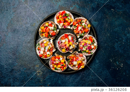 Peruvian style food Scallops a la chalaca 36126208