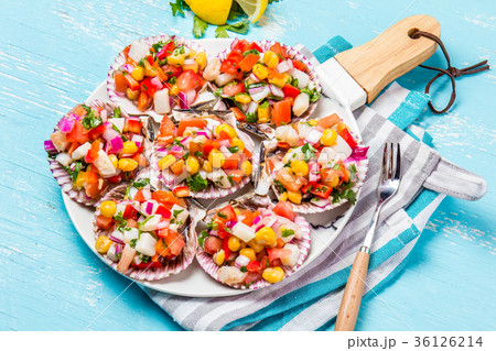 Peruvian style food Scallops a la chalaca 36126214