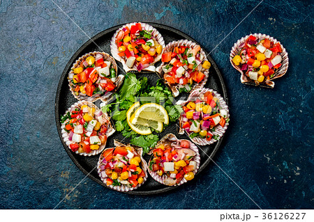 Peruvian style food Scallops a la chalaca Peruvian style food Scallops a la chalaca 36126227