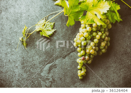 Grape and corkscrews wine concept, Stone Grape and corkscrews wine concept, Stone 36126404
