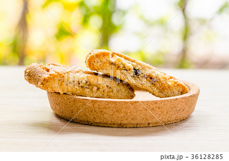 Apple strudel crispy pies on wood background. Apple strudel crispy pies on wood background. 36128285