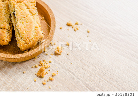 Apple strudel crispy pies on wood background. Apple strudel crispy pies on wood background. 36128301