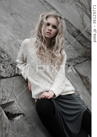 beautiful young blonde woman with blue eyes beautiful young blonde woman with blue eyes 36129771
