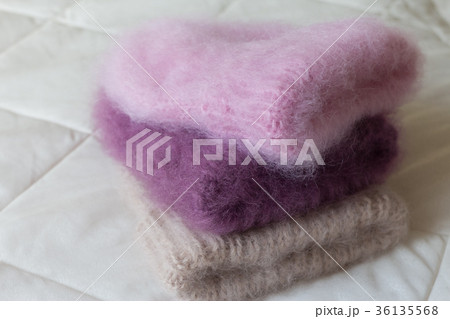 Fluffy hats of various styles and colors hand Fluffy hats of various styles and colors hand 36135568