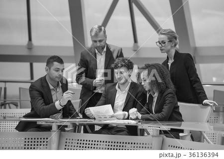 Group of business people having meeting together Group of business people having meeting together 36136394