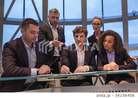 Group of business people having meeting together 36136406