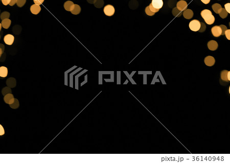 Abstract gold sparkle on dark background 36140948