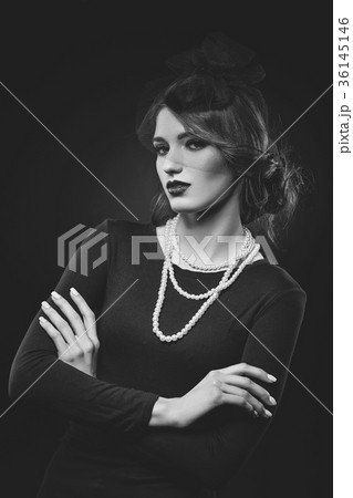 beautiful girl with pearl necklace and veil hat 36145146