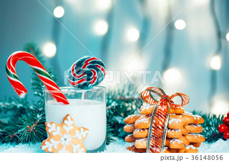 Christmas gingerbread and milk with decorations Christmas gingerbread and milk with decorations 36148056