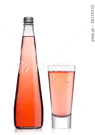 Bottle and glass of sparkling pink soda lemonade 36150532