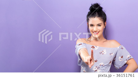 Young woman pointing at something Young woman pointing at something 36151761