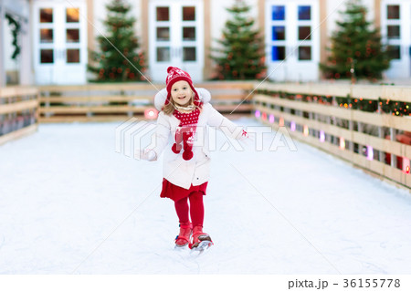 Kids ice skating in winter. Ice skates for child. 36155778