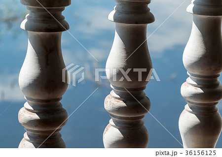 The old balustrades made by white cement closeup The old balustrades made by white cement closeup 36156125