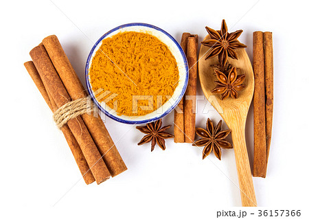 brown cinnamon stick and powder with star anise brown cinnamon stick and powder with star anise 36157366