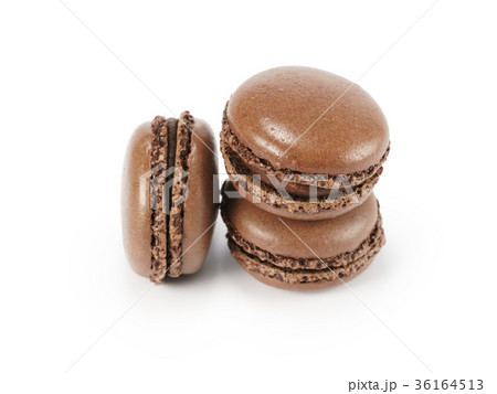 three chocolate macarons isolated on white 36164513
