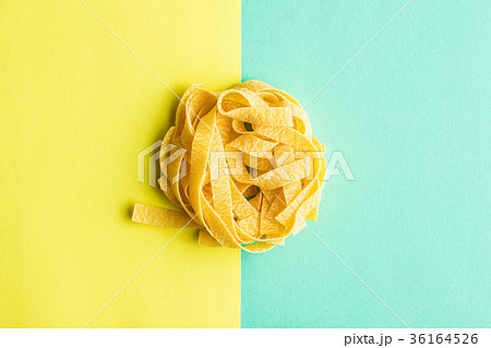 Raw tagliatelle pasta. Raw tagliatelle pasta. 36164526