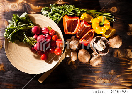 Organic healthy food. Vedetables on burned wooden Organic healthy food. Vedetables on burned wooden 36165925