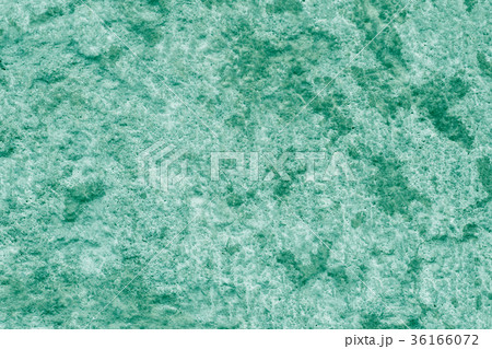 Emerald green painted stucco wall. 36166072