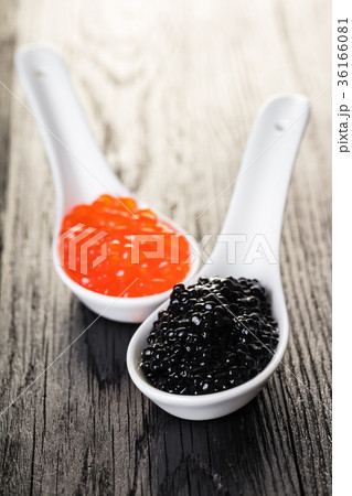 red and black caviar in spoon 36166081