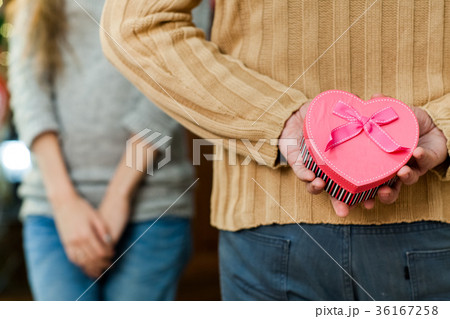 man making surprise to his wife on valentine's day 36167258