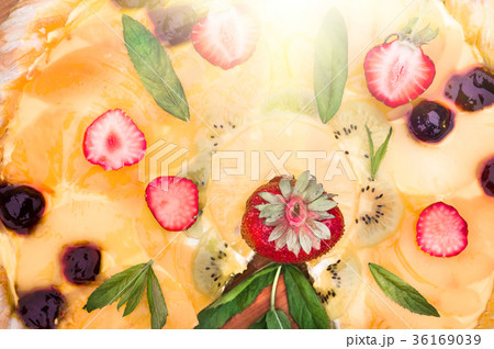 Fruit pizza with strawberries kiwi pineapple Fruit pizza with strawberries kiwi pineapple 36169039