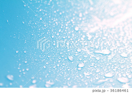 rain water drops on blue sponge surface  36186461