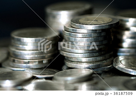 Close up silver money coin stacking on dark  36187509