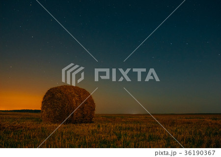 Night dark sky with a haystack in the field Night dark sky with a haystack in the field 36190367