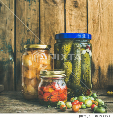 Autumn pickled vegetables in jars, copy space Autumn pickled vegetables in jars, copy space 36193453