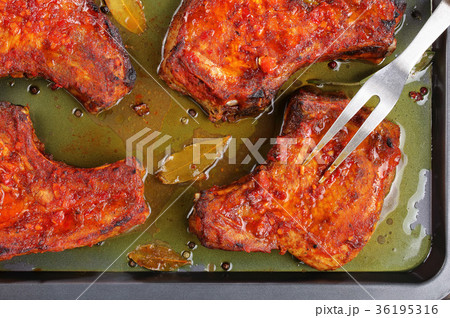 juicy Pork Chops on baking sheet 36195316