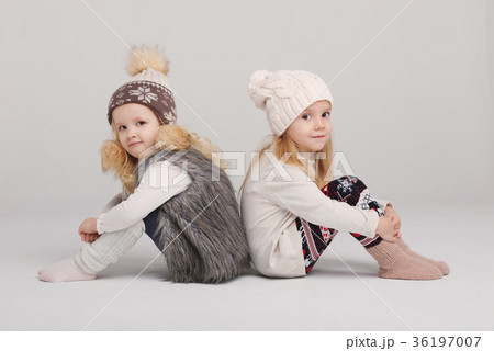 two beautiful girls on white background 36197007