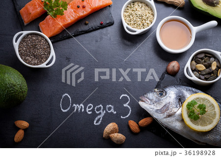 Black slate table with product rich in omega 3. Black slate table with product rich in omega 3. 36198928