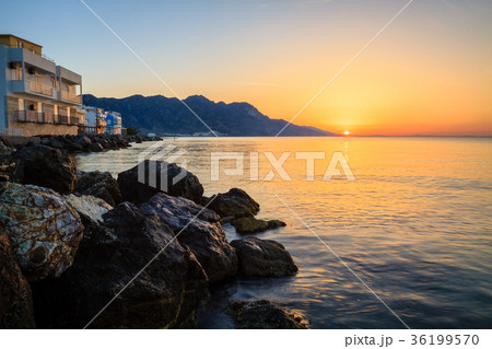 Beautiful sunrise landscape with sea, rock Beautiful sunrise landscape with sea, rock 36199570