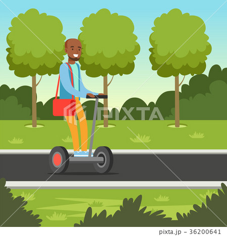 Young african man riding on segway scooter in the Young african man riding on segway scooter in the 36200641