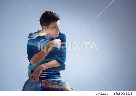 Focused handsome gentleman thinking about serious 36205111